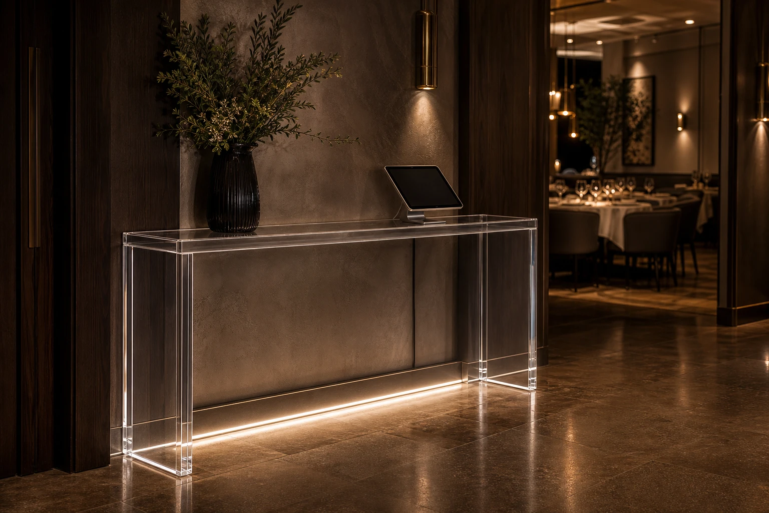 Clear cast acrylic console table at a fine-dining restaurant reception