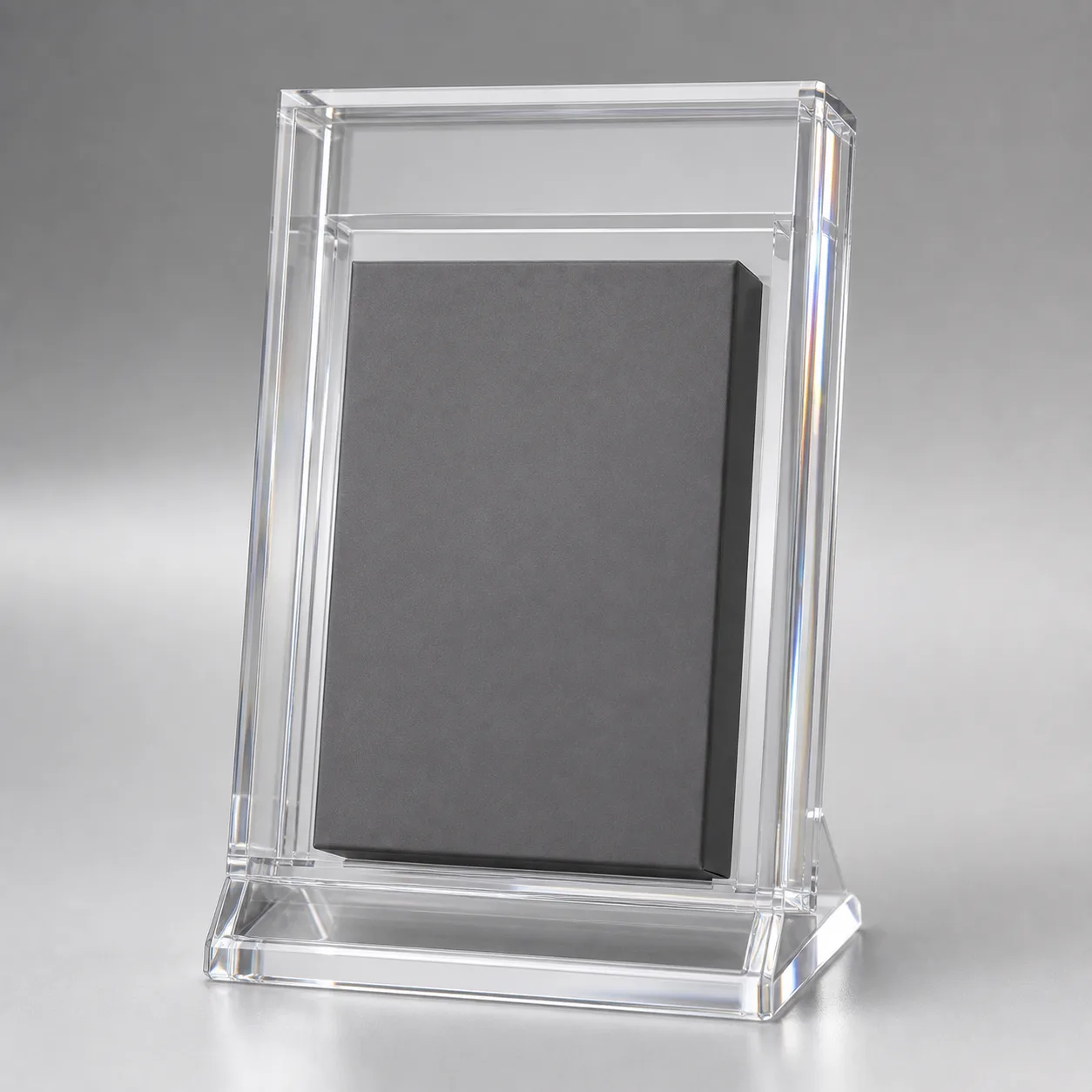 Clear acrylic display case holding a WATA graded sealed video game upright, box art fully visible through the shell